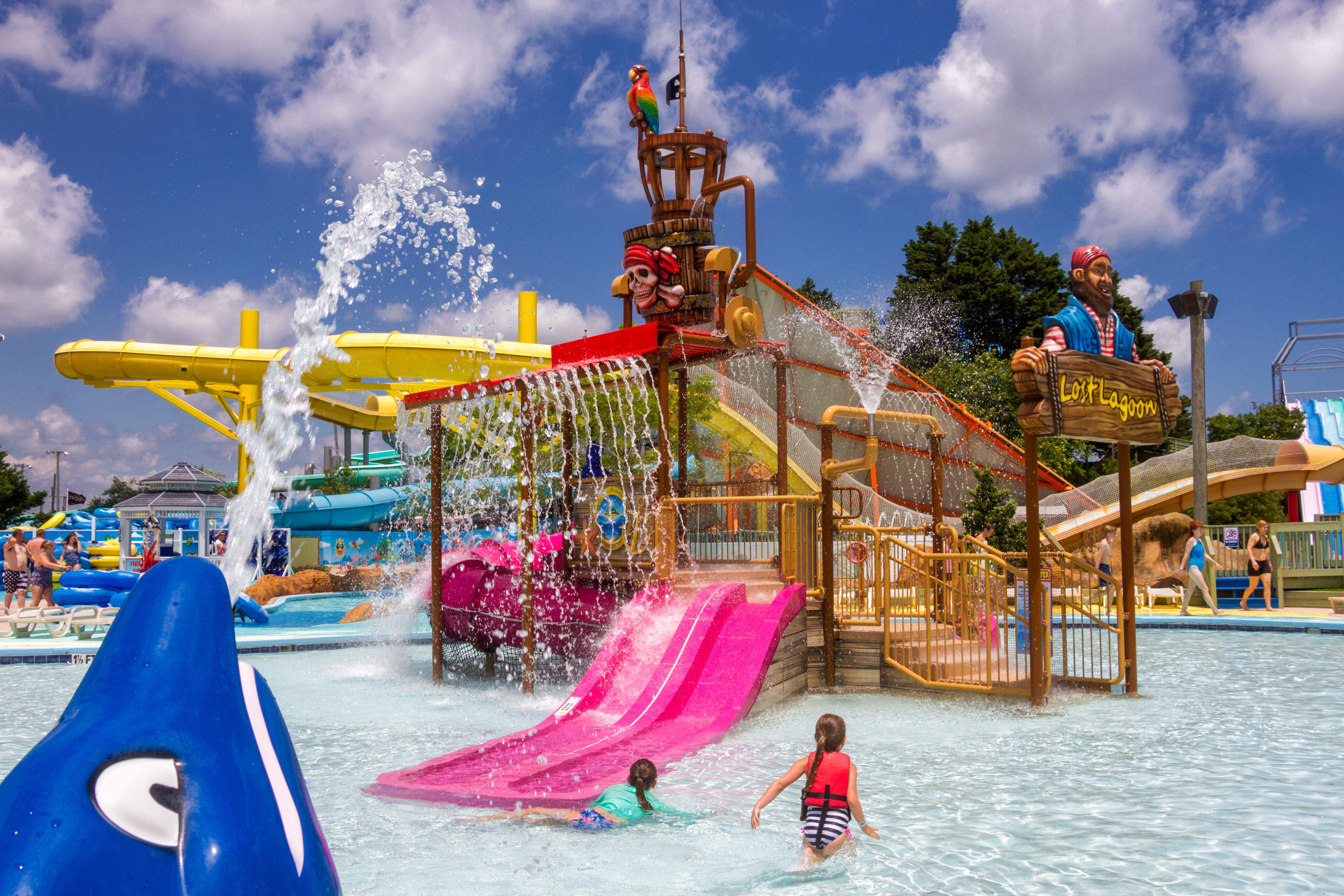 splash-mountain-lost-lagoon a childrens play area in a water park on a bright sunny day